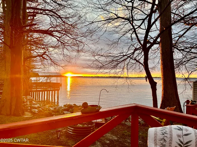 a backyard of a house with seating space