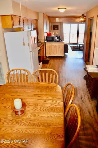 a view of kitchen island with furniture and a view of kitchen