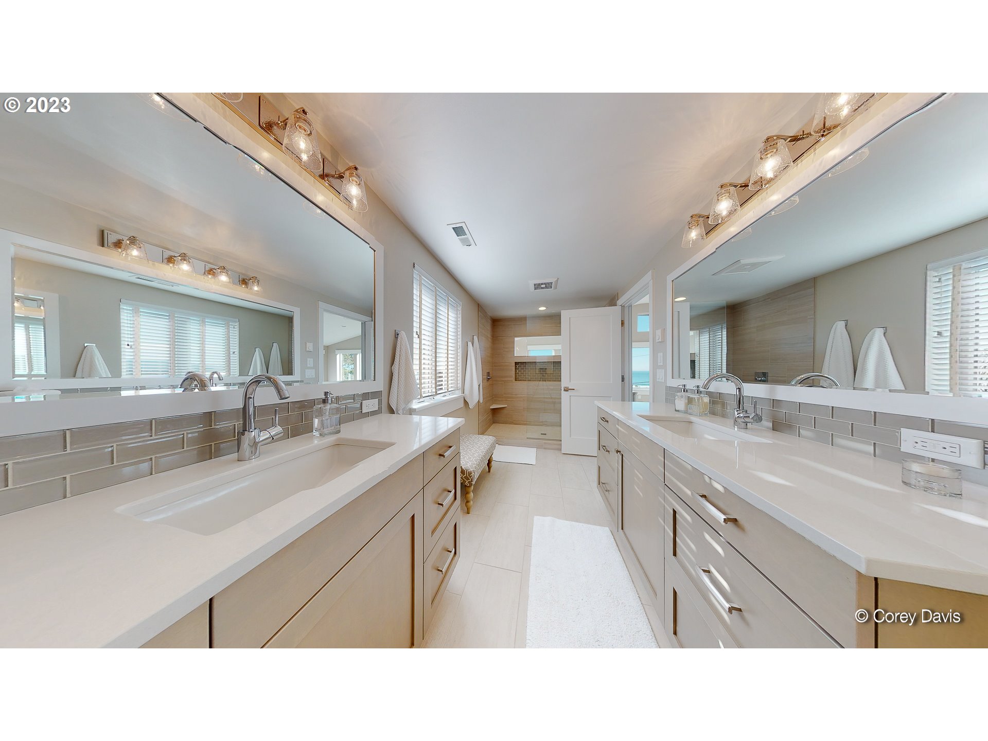 37995 Beulah Reed Road Nehalem, OR 97131 - Photo 20 of 32 a bathroom with a sink double vanity and a mirror