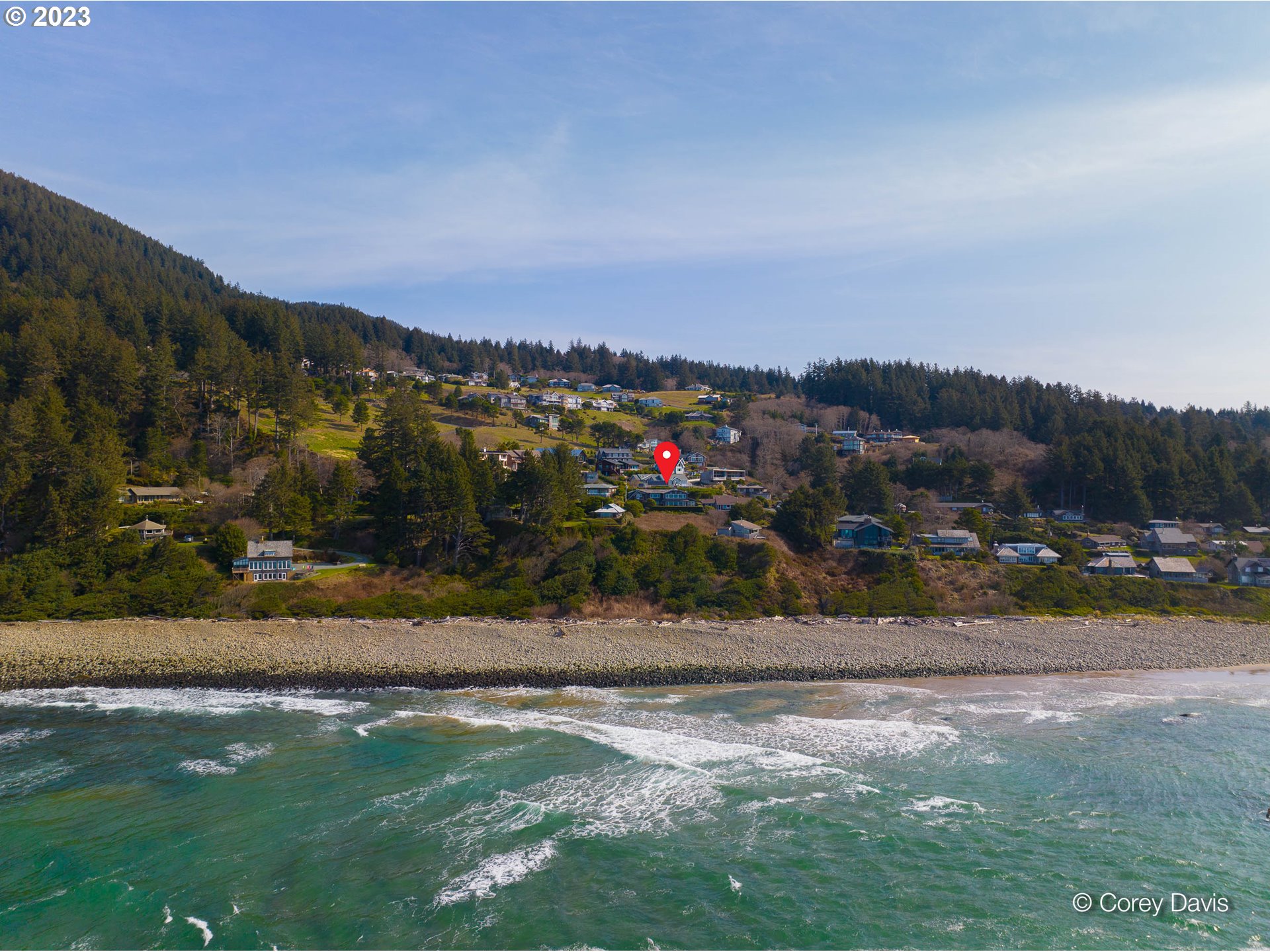 37995 Beulah Reed Road Nehalem, OR 97131 - Photo 2 of 32 a view of a town with mountains in the background