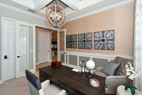 5507 Arnie Loop Lakewood Ranch, FL 34211 - Photo 20 of 68 a living room with furniture and a clock