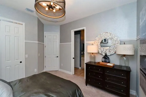 a bathroom that has a shower and a window