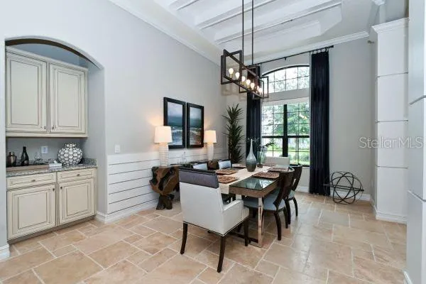 a view of a livingroom with furniture and window