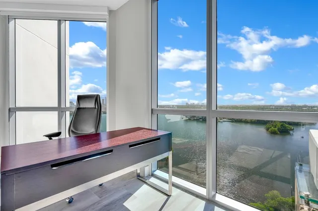 a view of a lake with a city