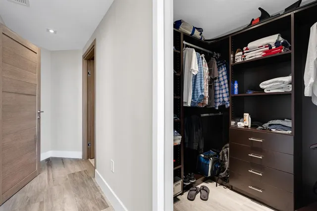 a view of a lake with tall buildings