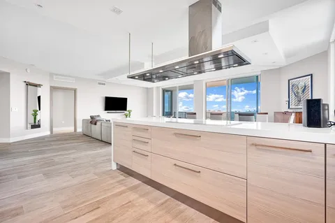 a en suite bathroom with a tub shower and window
