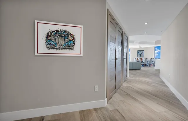 a view of a dining room with furniture and window