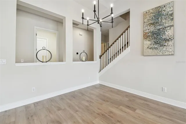 a kitchen with stainless steel appliances sink stove top oven and cabinets
