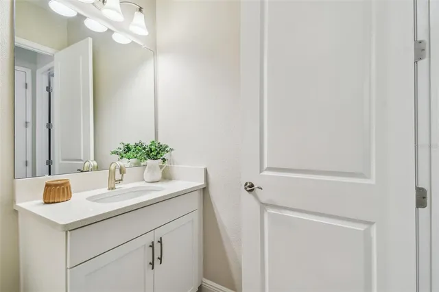 a view of a city with lawn chairs and palm trees