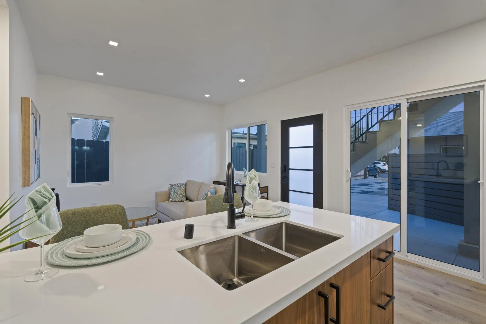 3582 Hatteras Avenue San Diego, CA 92117 - Photo 12 of 33 a kitchen with a table and chairs
