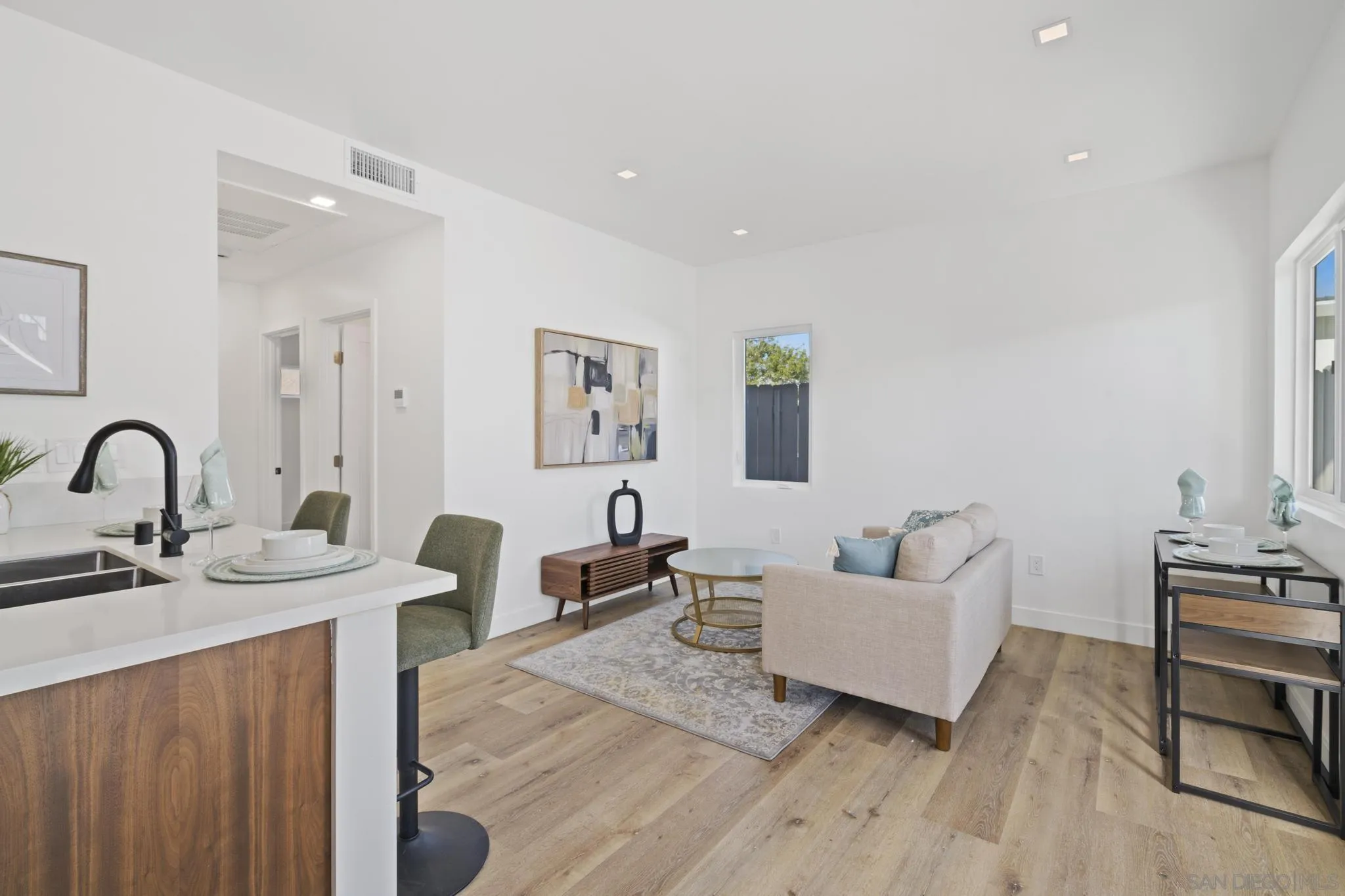 3582 Hatteras Avenue San Diego, CA 92117 - Photo 16 of 33 a living room with furniture and wooden floor