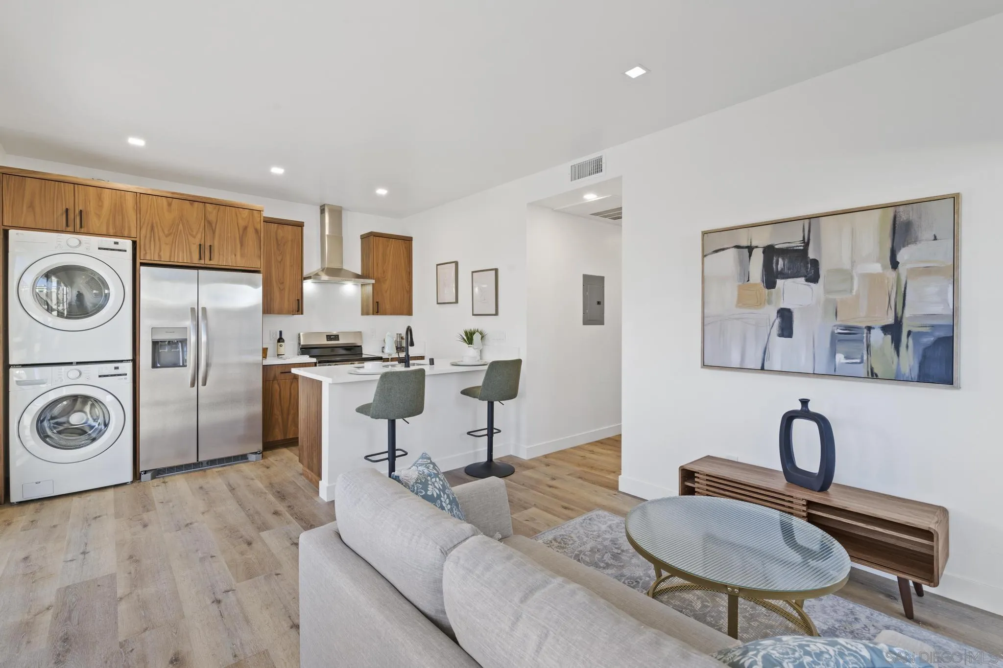 3582 Hatteras Avenue San Diego, CA 92117 - Photo 23 of 33 a living room with furniture and a fireplace