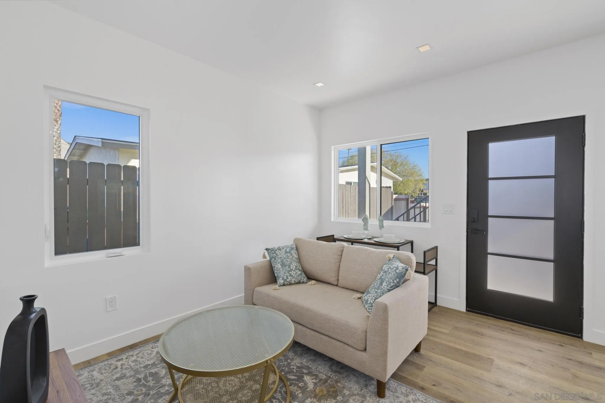 3582 Hatteras Avenue San Diego, CA 92117 - Photo 24 of 33 a living room with furniture and a window