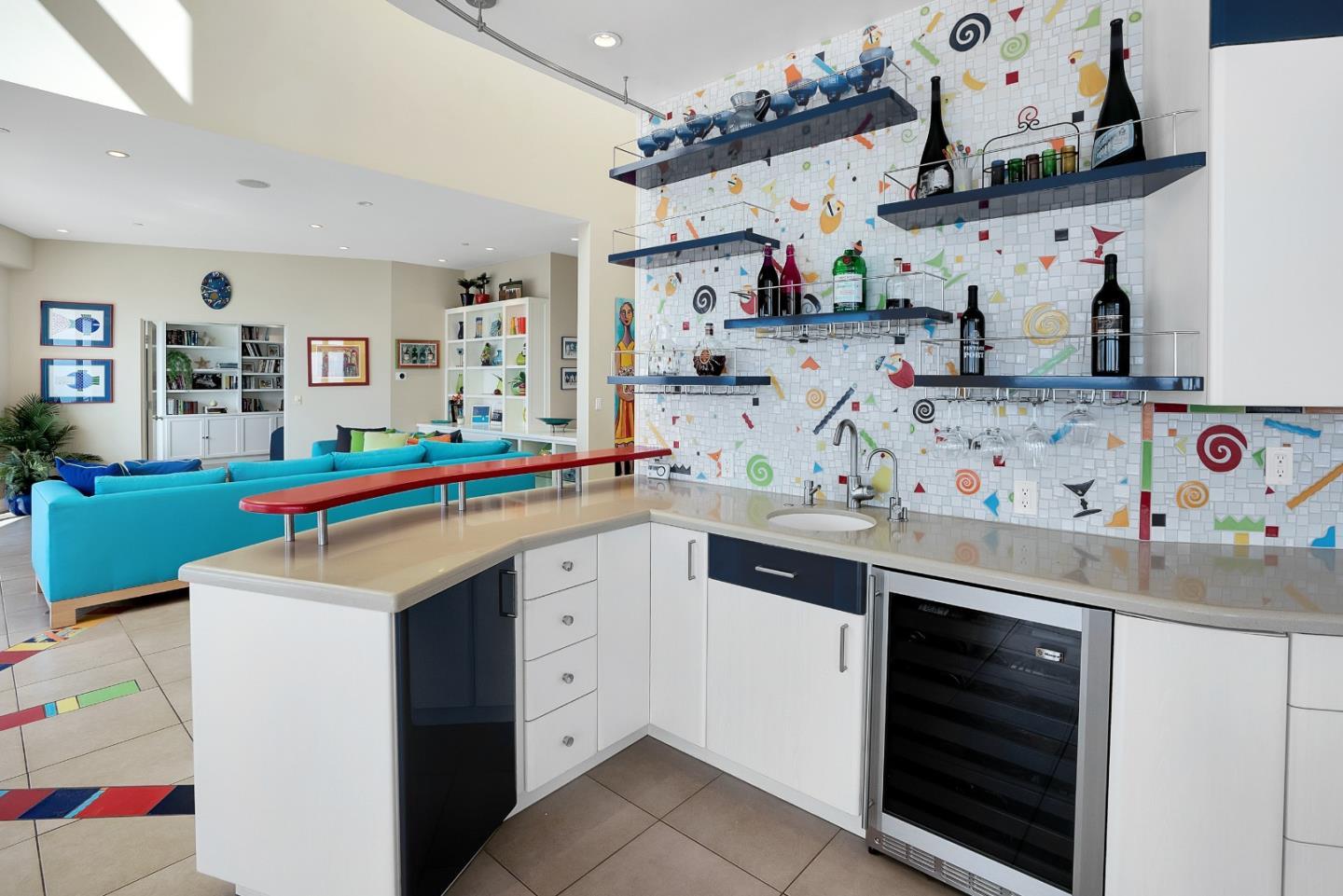 422 Seaview Drive Aptos, CA 95003 - Photo 26 of 58 a kitchen with kitchen island a white counter top space and cabinets