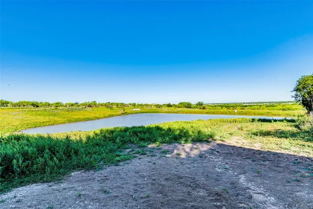 a view of a lake with a beach