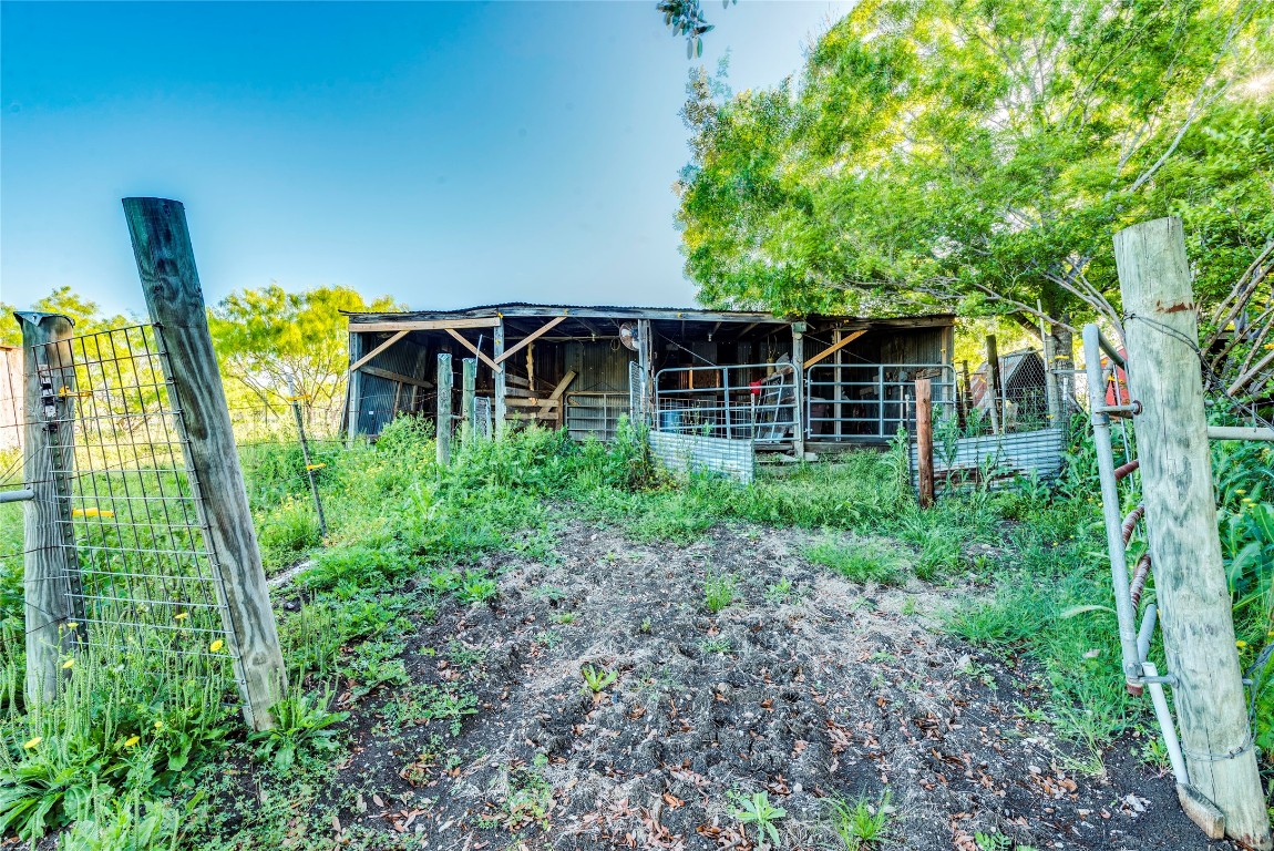 501 Engelke Road Kyle, TX 78640 - Photo 15 of 20 a front view of a house with garden