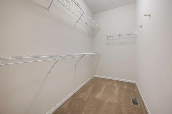 a view of a room with racks on the wall