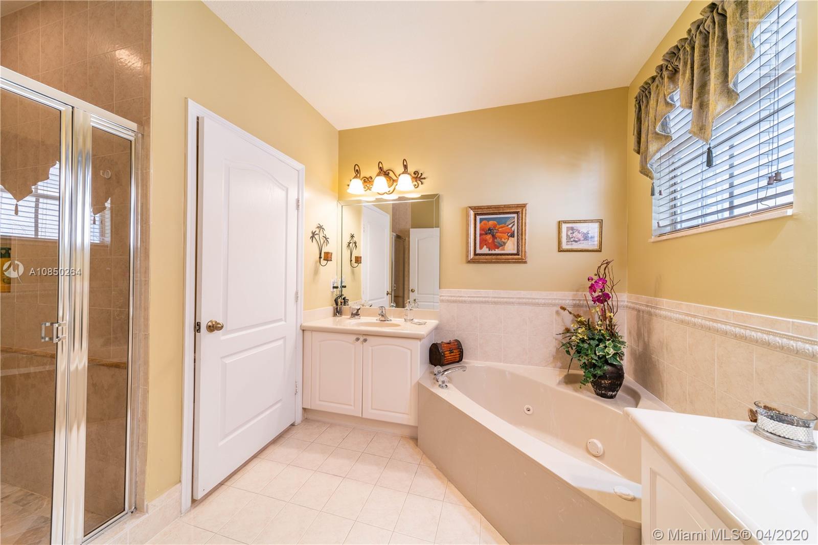 14933 Southwest 22 Street Miami, FL 33185 - Photo 34 of 49 Master Bathroom w/ roman tub & separate shower
