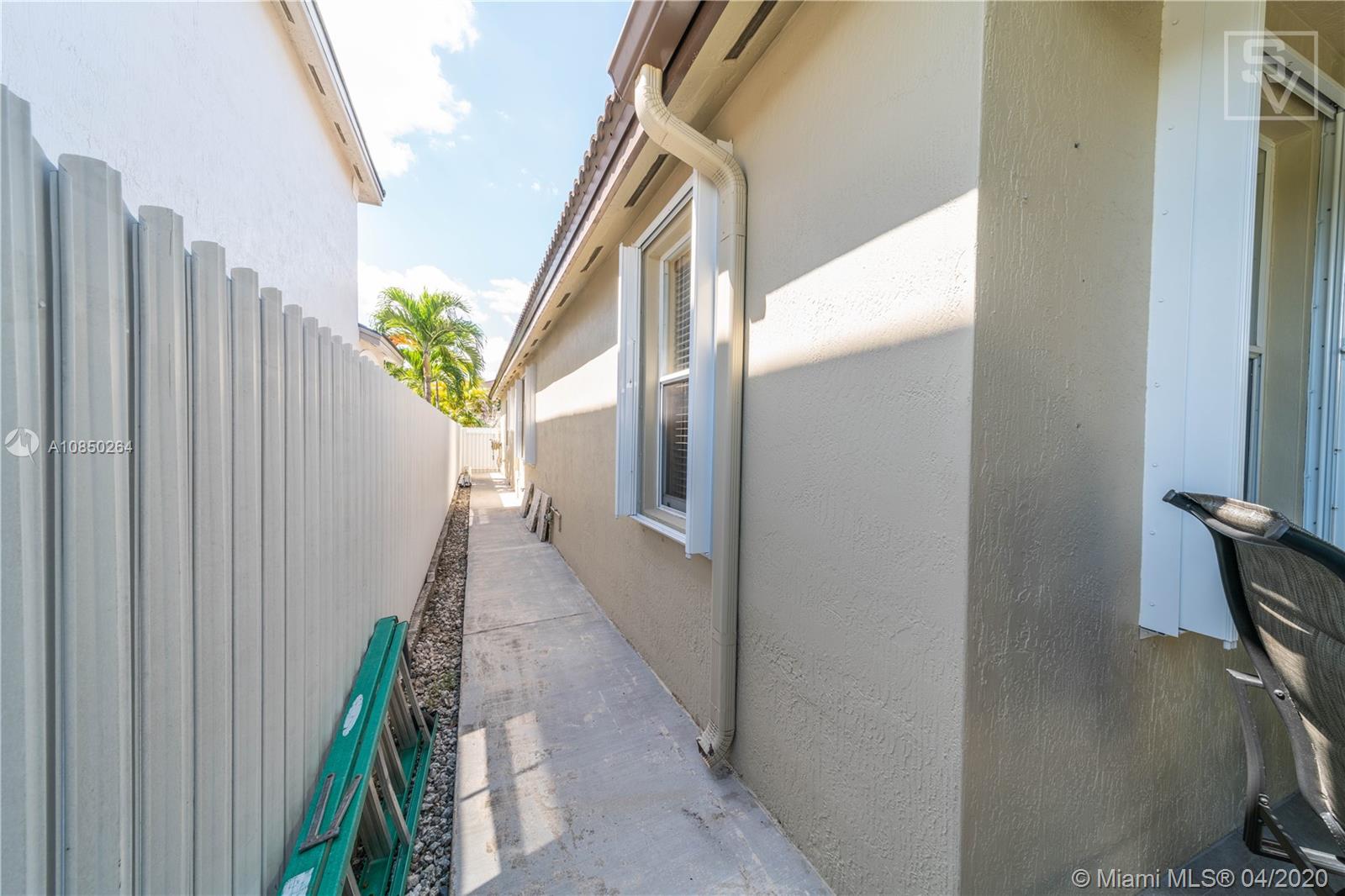 14933 Southwest 22 Street Miami, FL 33185 - Photo 49 of 49 Side walkway