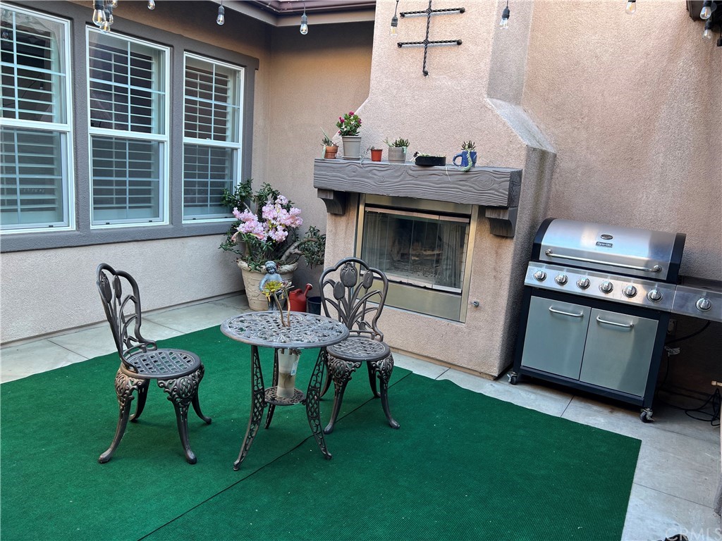 52 Shadowplay Irvine, CA 92620 - Photo 14 of 18 a view of a dining room with furniture window and outside view