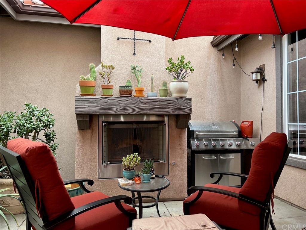 52 Shadowplay Irvine, CA 92620 - Photo 16 of 18 a view of a dining room with furniture and chandelier