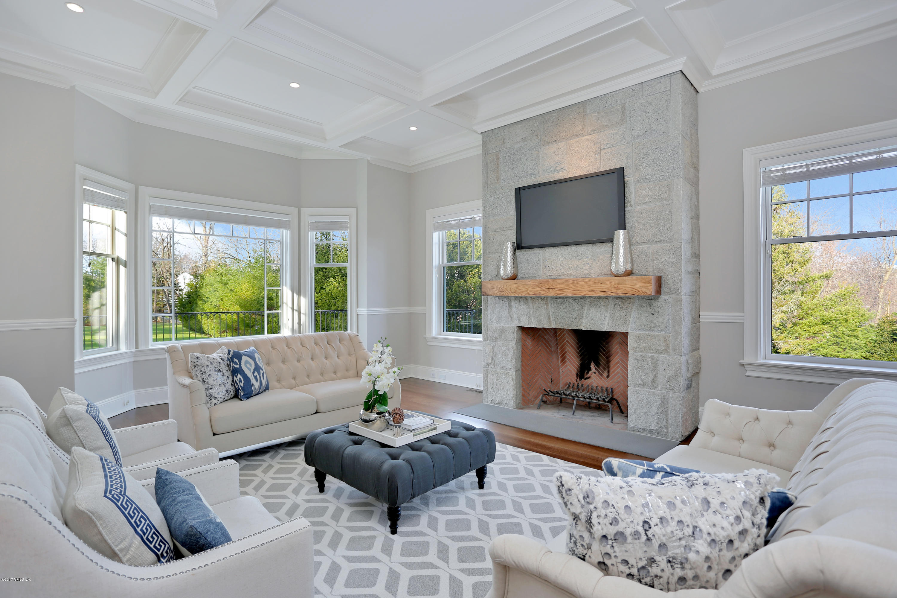 123 Doubling Road Greenwich, CT 06830 - Photo 13 of 31 a living room with furniture and a fireplace
