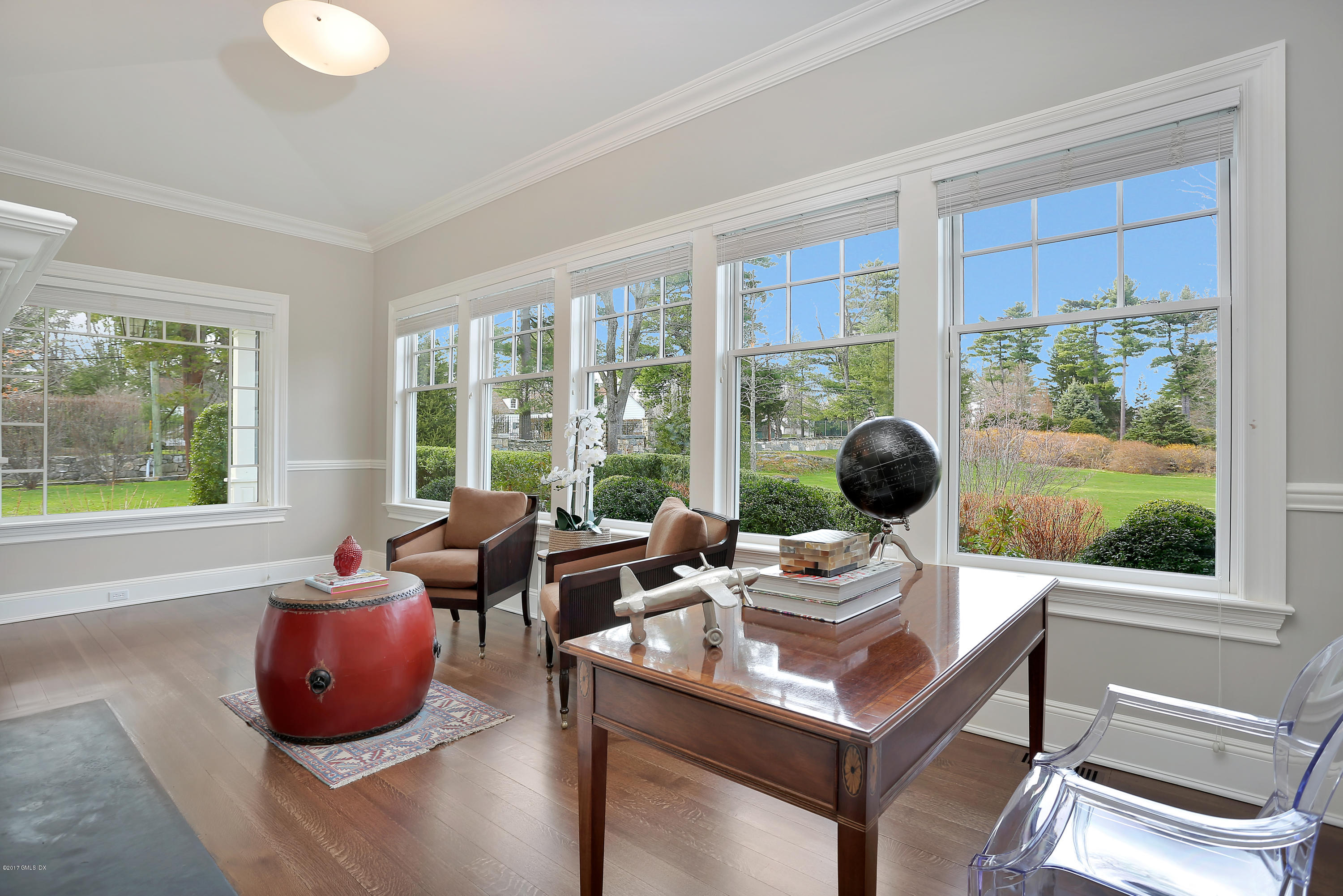 123 Doubling Road Greenwich, CT 06830 - Photo 6 of 31 a living room with furniture and a floor to ceiling window