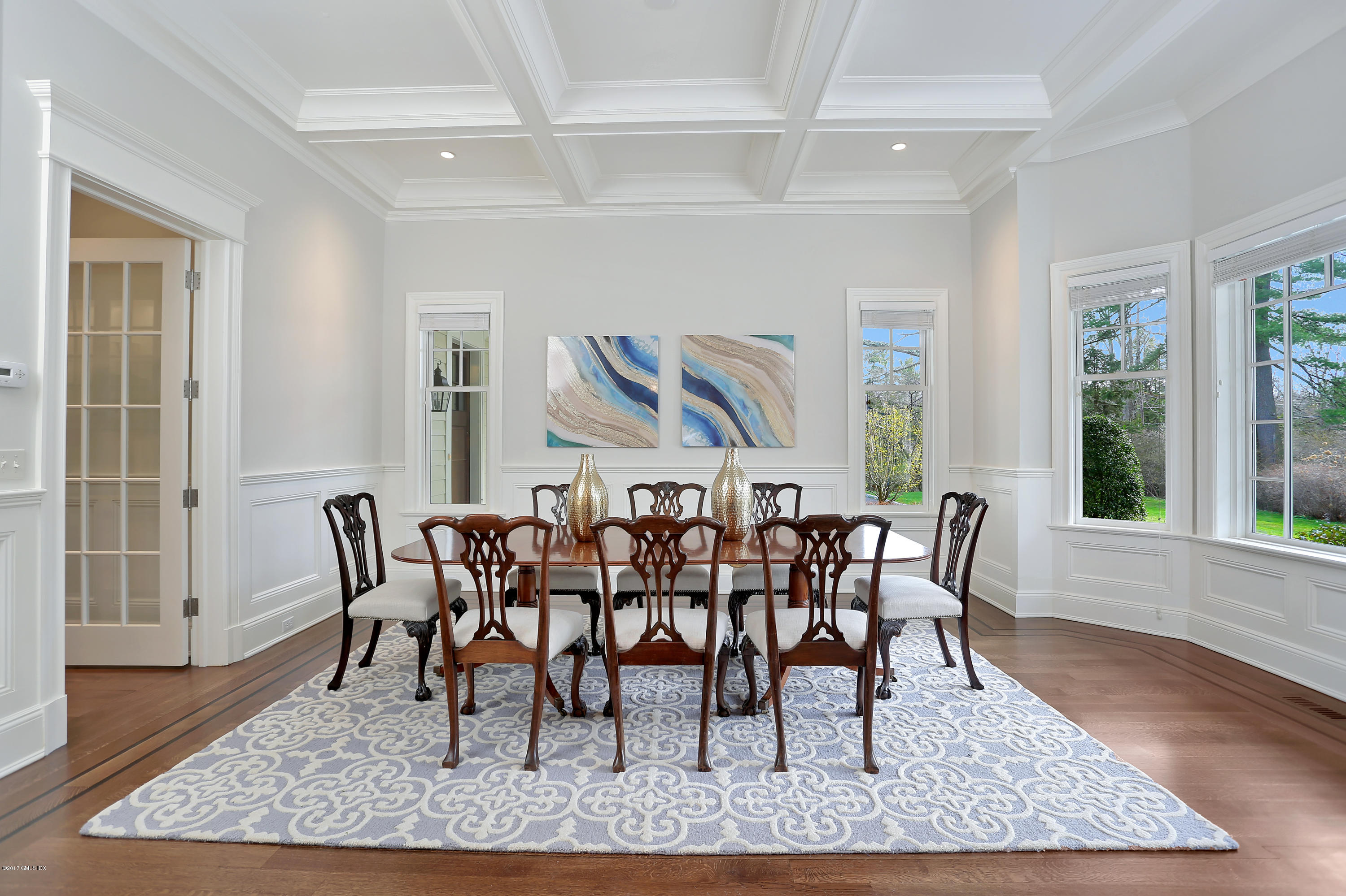 123 Doubling Road Greenwich, CT 06830 - Photo 7 of 31 a view of a dining room with furniture window and wooden floor