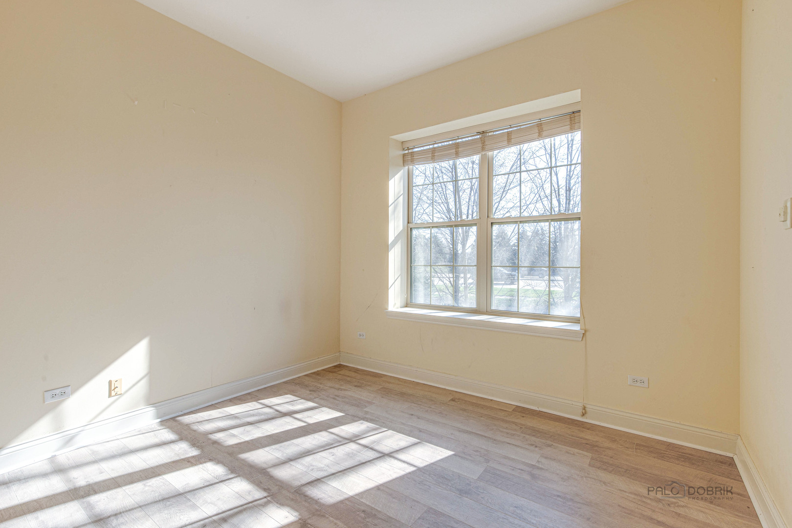 2700 Summit Drive, Unit 209 Glenview, IL 60025 - Photo 14 of 23 a view of an empty room and window