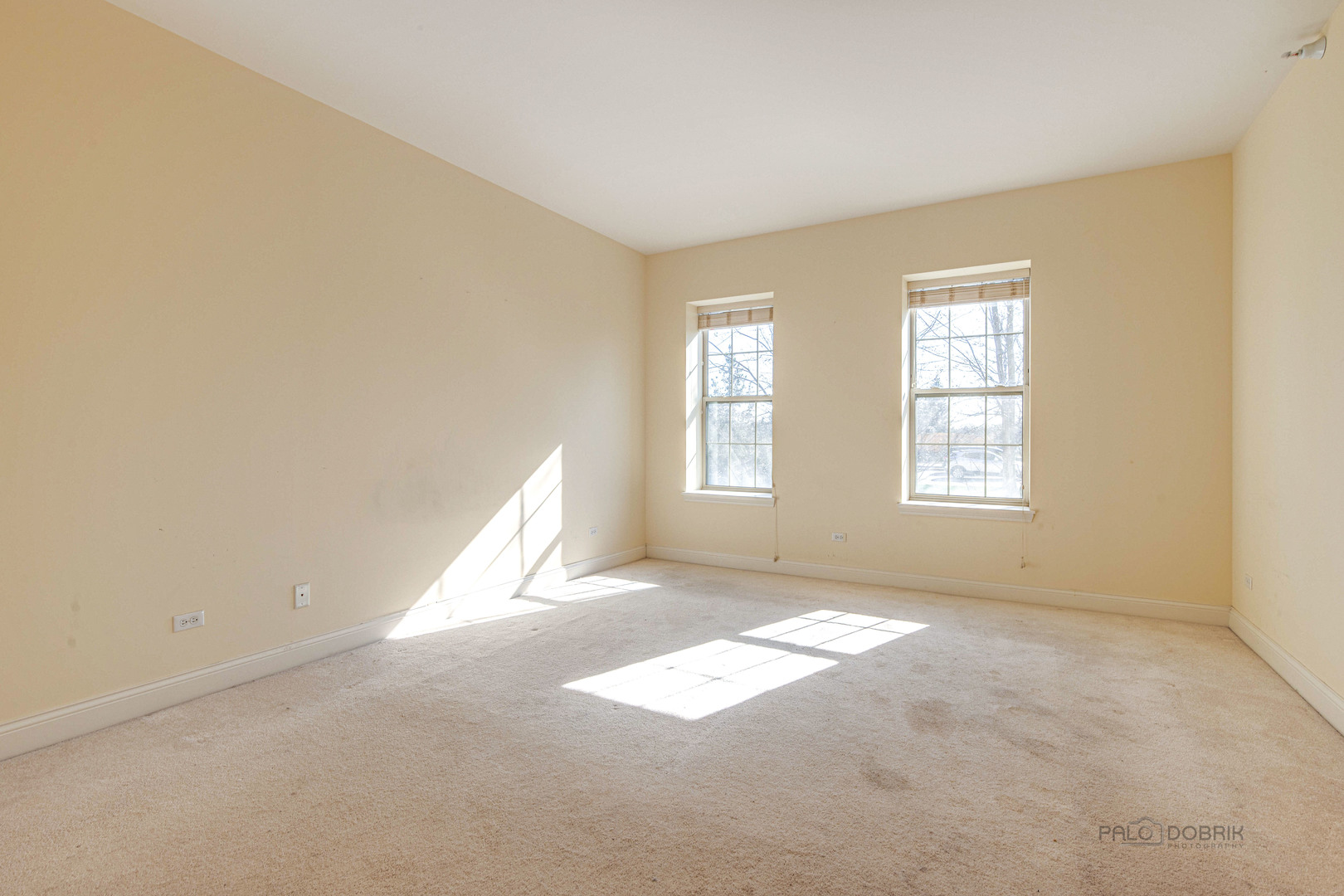 2700 Summit Drive, Unit 209 Glenview, IL 60025 - Photo 16 of 23 an empty room with windows