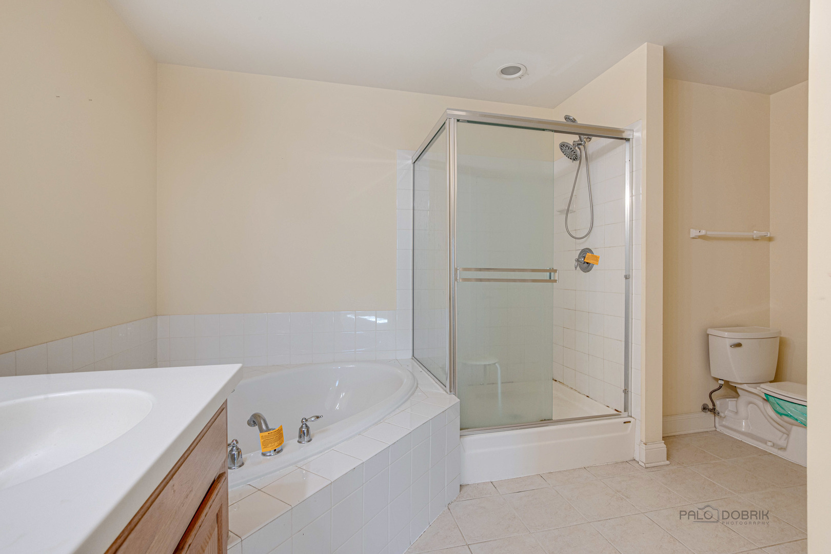 2700 Summit Drive, Unit 209 Glenview, IL 60025 - Photo 20 of 23 a bathroom with a bathtub and a shower