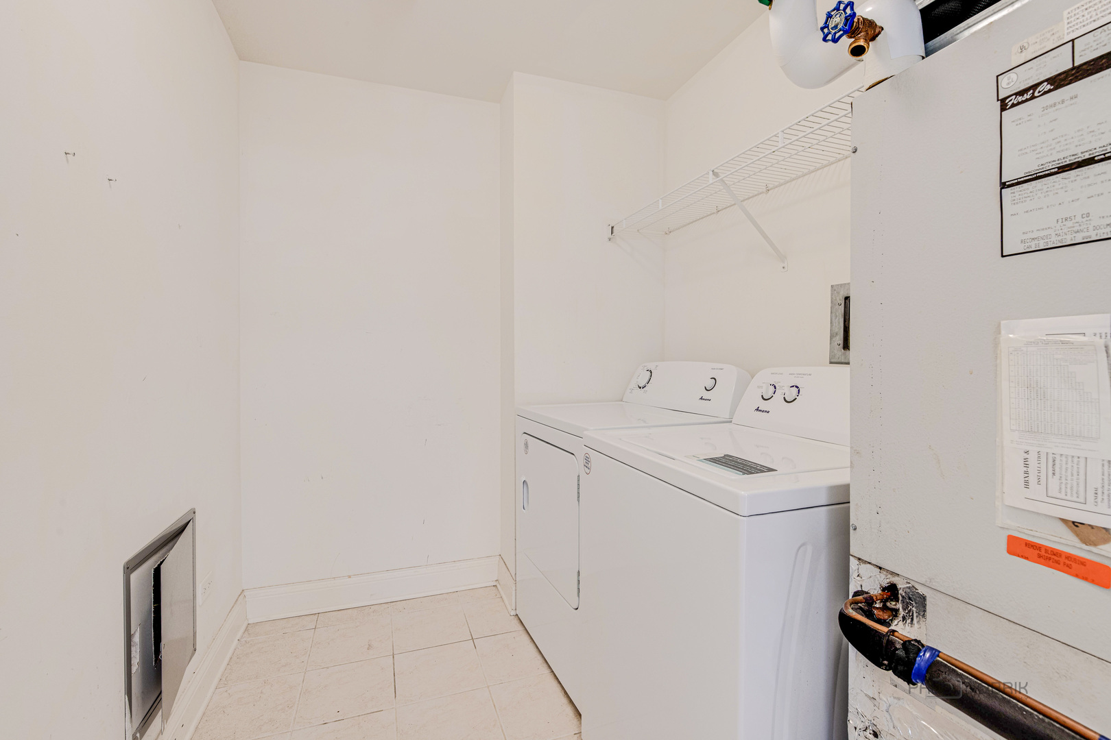 2700 Summit Drive, Unit 209 Glenview, IL 60025 - Photo 21 of 23 a utility room with dryer and washer