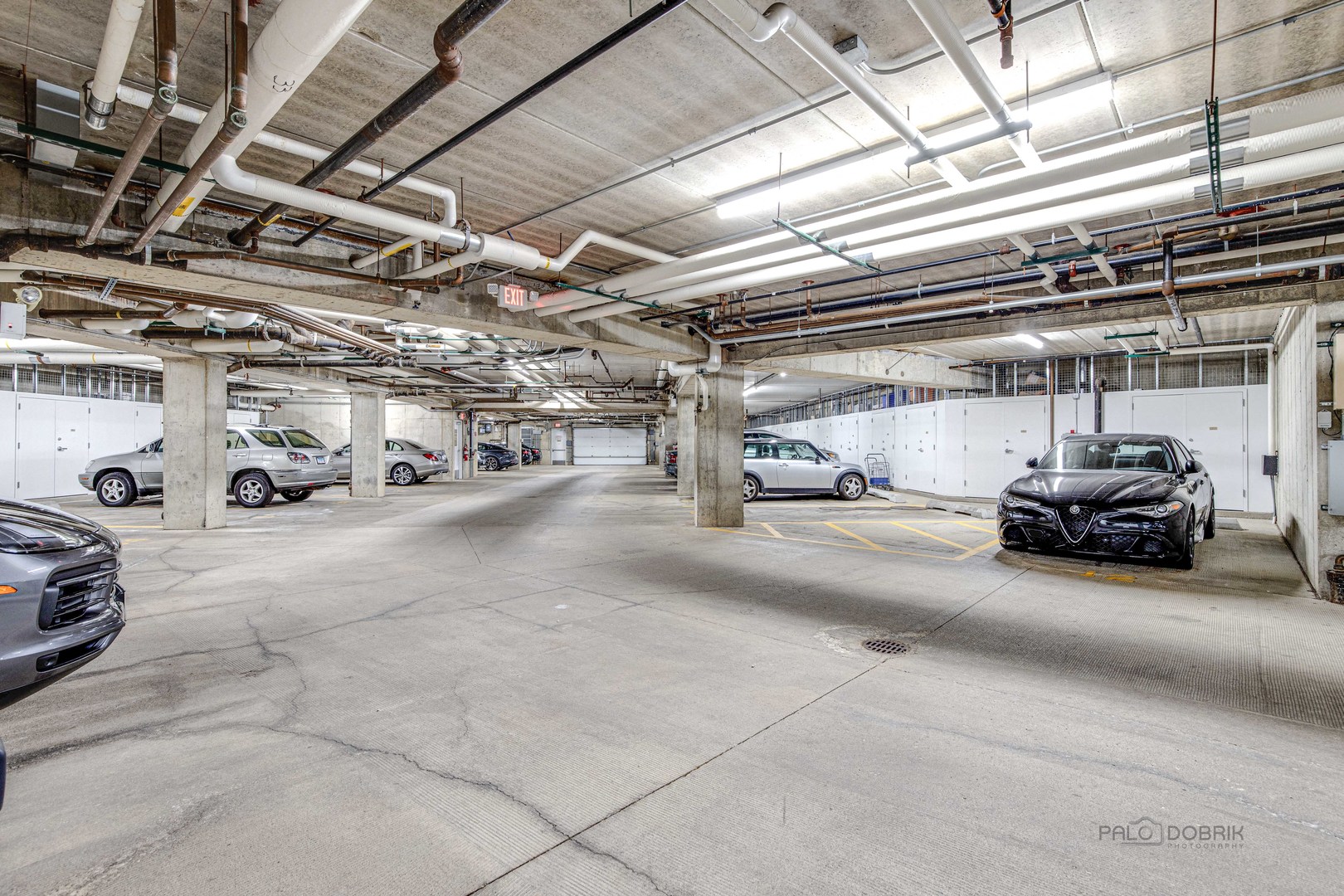 2700 Summit Drive, Unit 209 Glenview, IL 60025 - Photo 23 of 23 a view of parking garage with cars