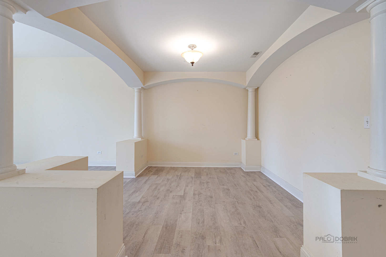2700 Summit Drive, Unit 209 Glenview, IL 60025 - Photo 4 of 23 an empty room with cabinet and a window