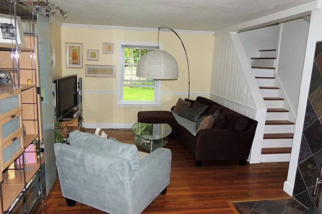 820 Dickinson Street Springfield, MA 01108 - Photo 8 of 29 a living room with furniture and a flat screen tv