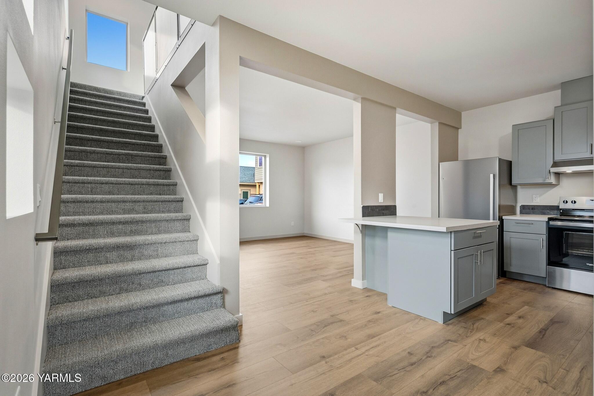 801 South 16th Avenue, Unit 4 Yakima, WA 98902 - Photo 11 of 22 a kitchen with cabinets and stainless steel appliances