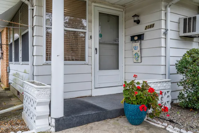 a flower plants in front of a house