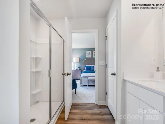 a bathroom with 2 sink tub and a mirror