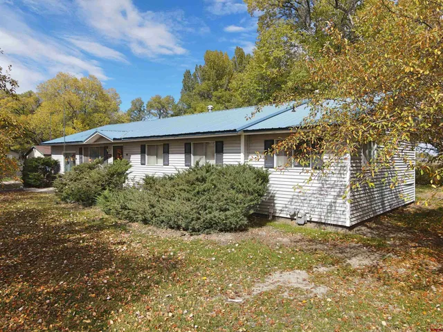 a view of a road with an ocean view
