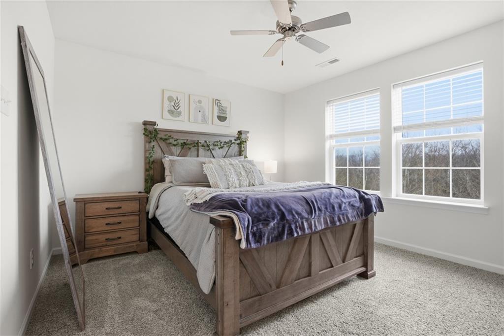 237 Truth Circle Harmony, PA 16037 - Photo 33 of 48 a bedroom with a bed next to a window