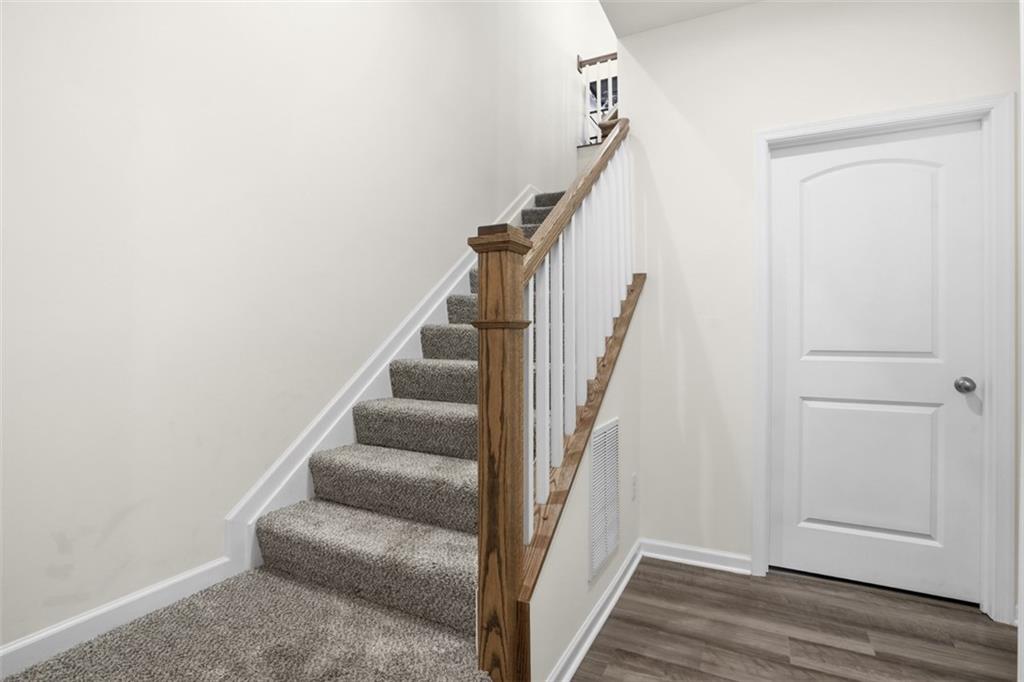 237 Truth Circle Harmony, PA 16037 - Photo 6 of 48 a view of entryway and hall with wooden floor
