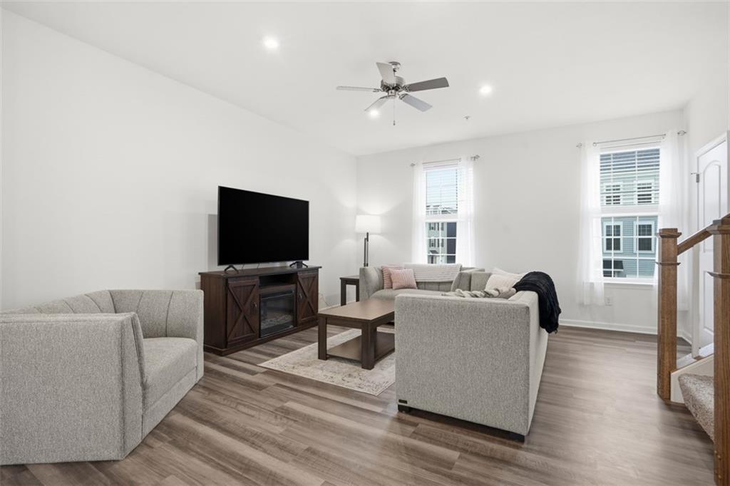 237 Truth Circle Harmony, PA 16037 - Photo 9 of 48 a living room with furniture and a flat screen tv