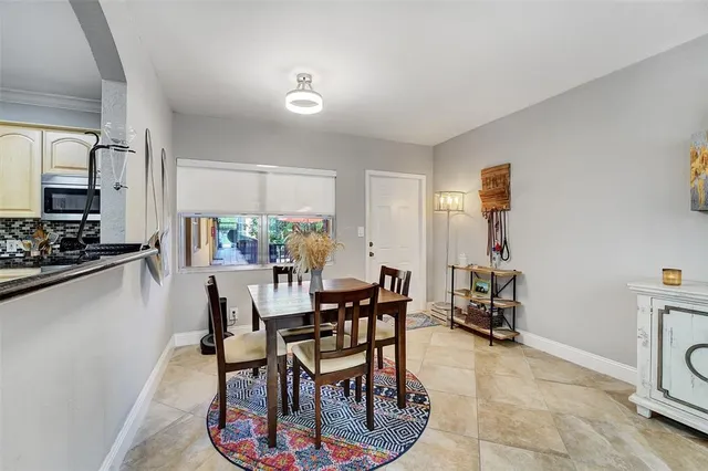 a kitchen with stainless steel appliances a refrigerator sink and stove