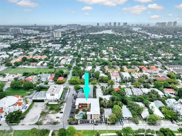an aerial view of a city with lots of residential buildings