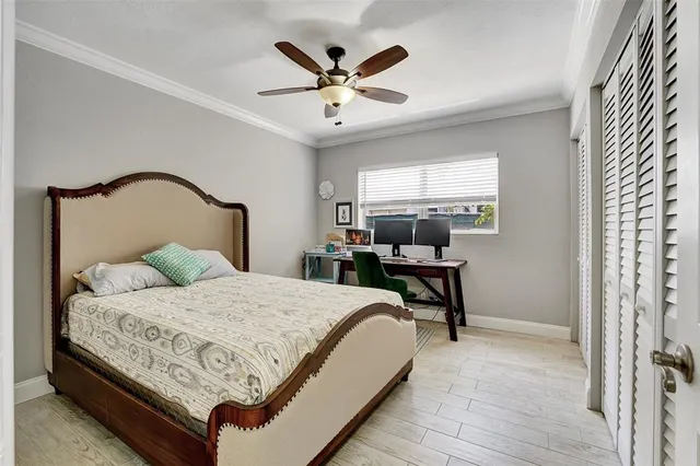 a bedroom with a bed furniture and a window
