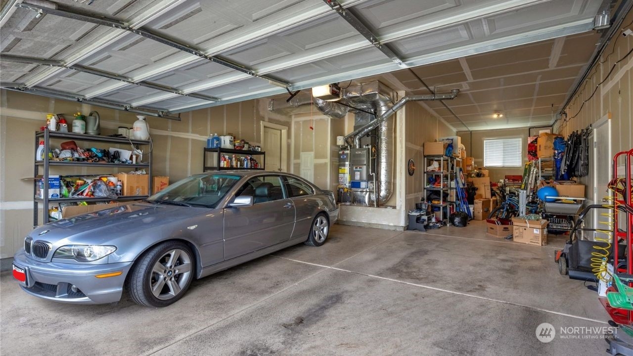 3926 216th Place Southeast Bothell, WA 98021 - Photo 24 of 31 a car parked in garage