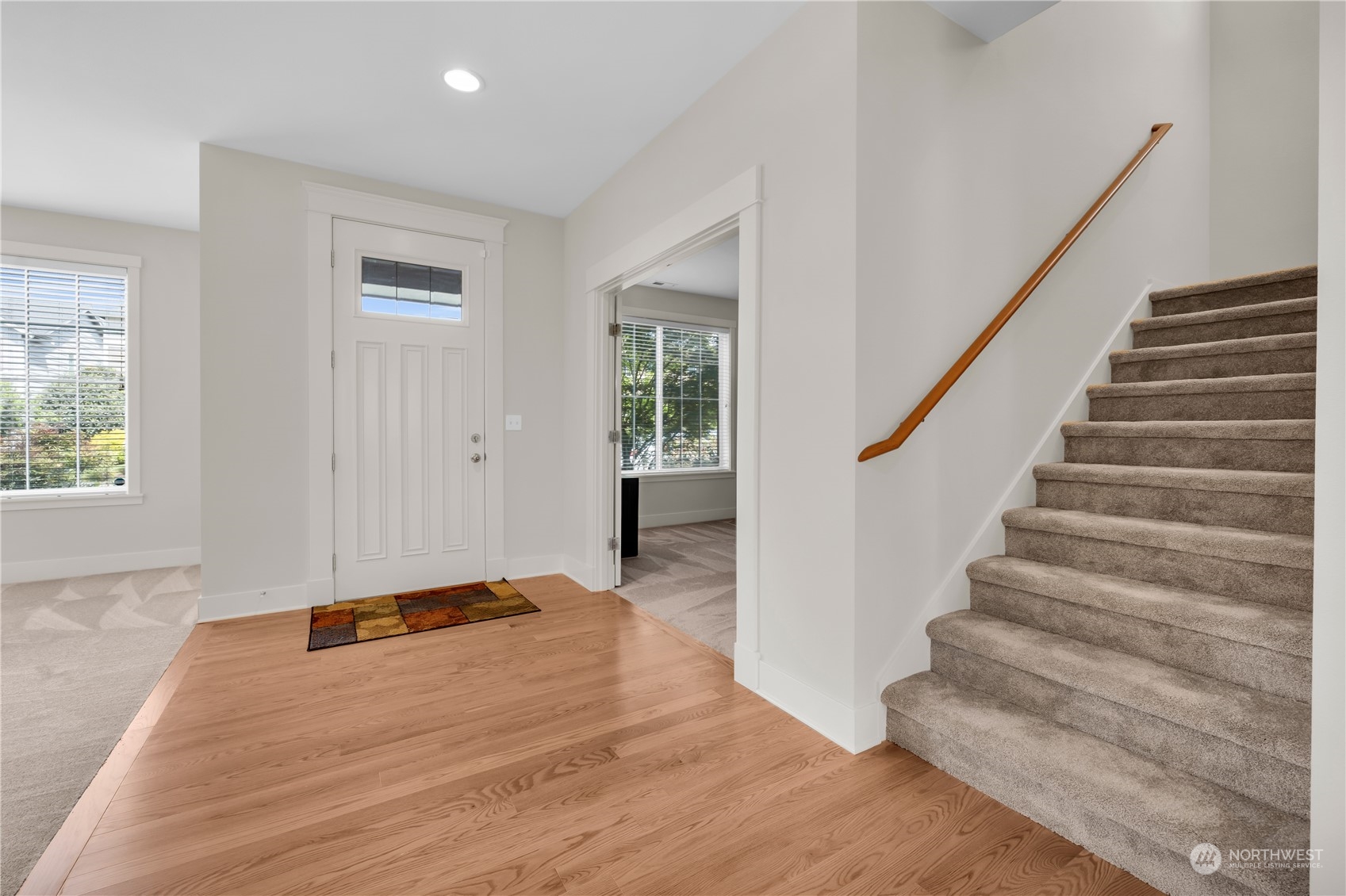 3926 216th Place Southeast Bothell, WA 98021 - Photo 3 of 31 a view of entryway and hall with wooden floor