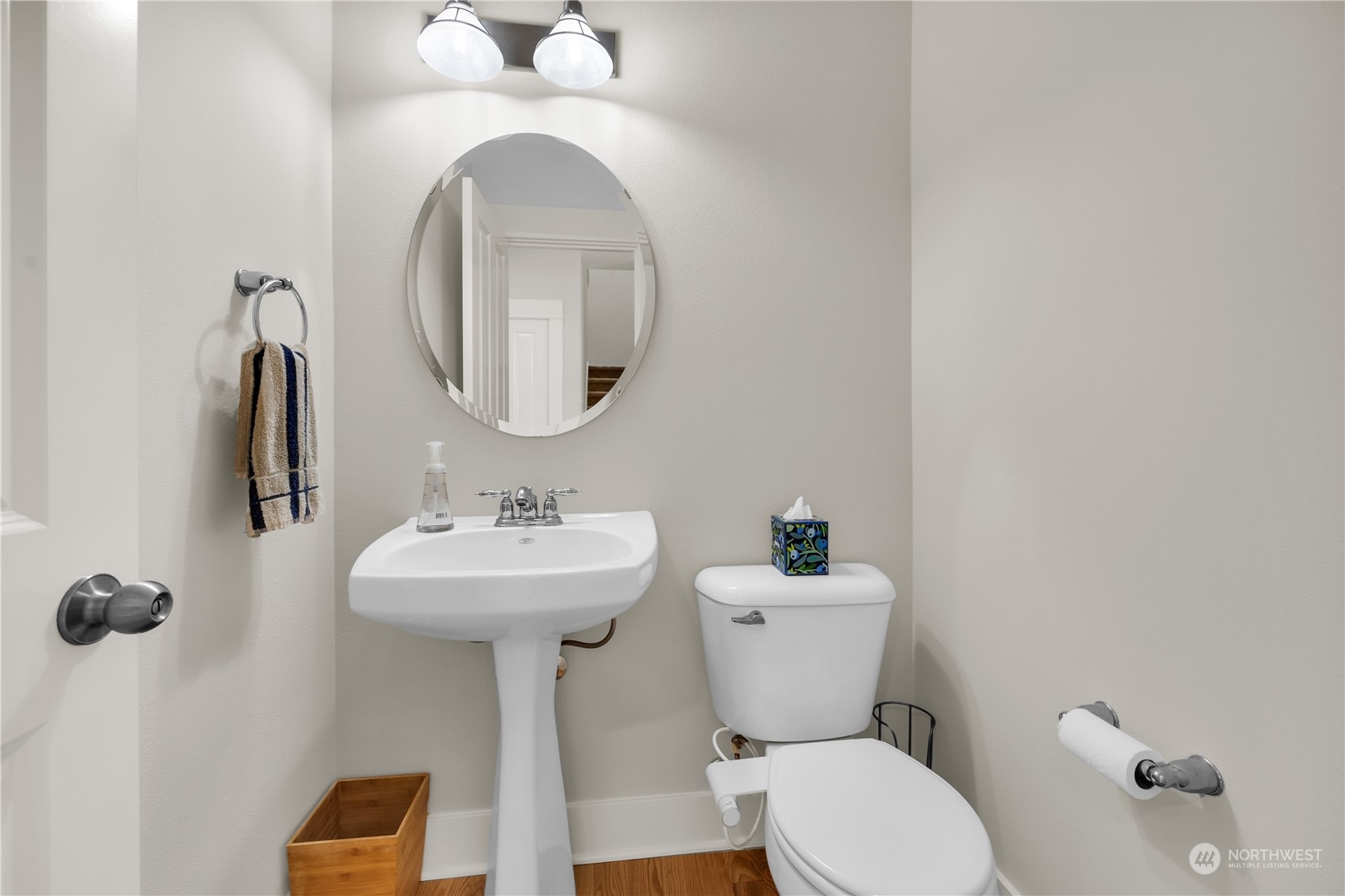 3926 216th Place Southeast Bothell, WA 98021 - Photo 6 of 31 a bathroom with a toilet sink and mirror