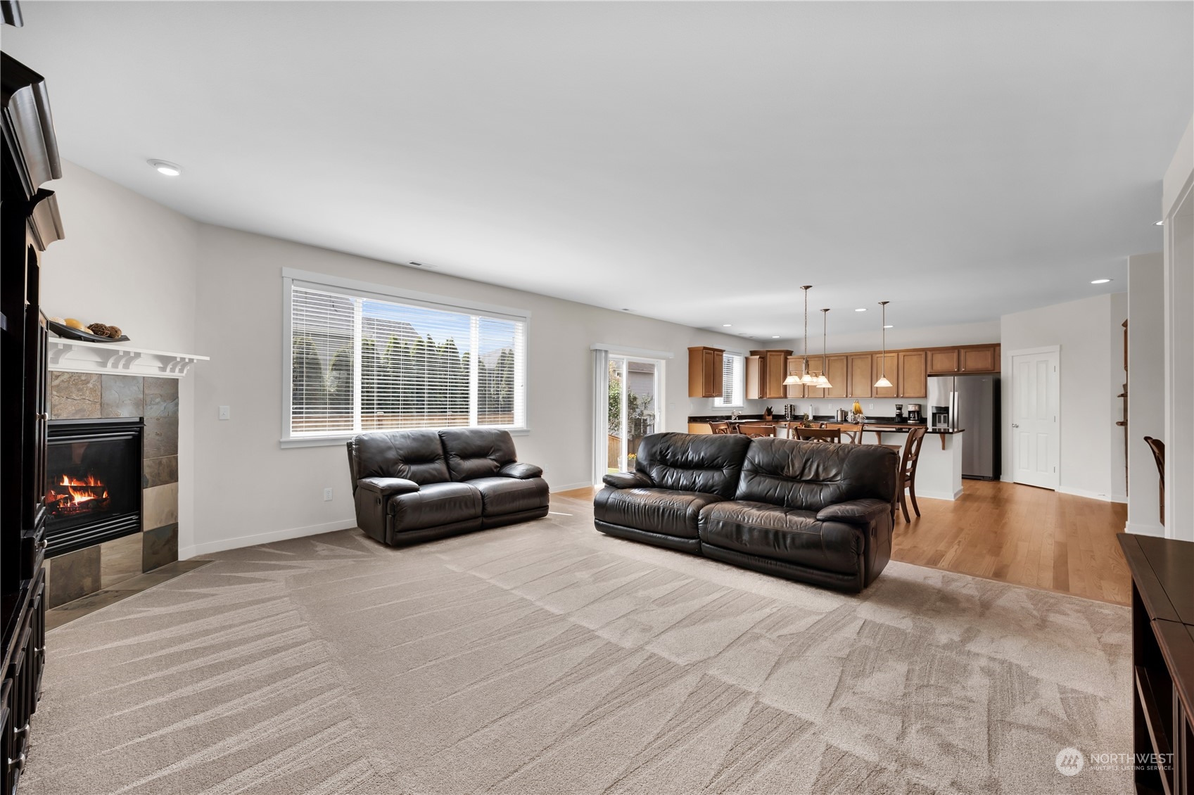 3926 216th Place Southeast Bothell, WA 98021 - Photo 8 of 31 a living room with furniture and a fireplace