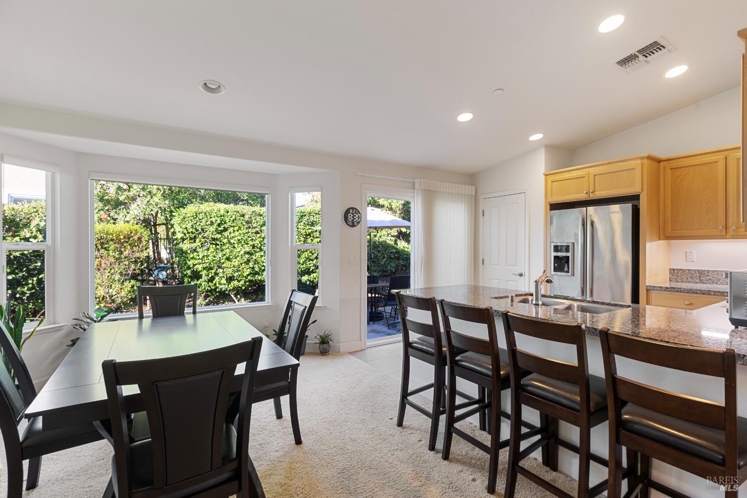 319 Birch Ridge Drive Rio Vista, CA 94571 - Photo 8 of 28 a dining room with furniture a chandelier and wooden floor